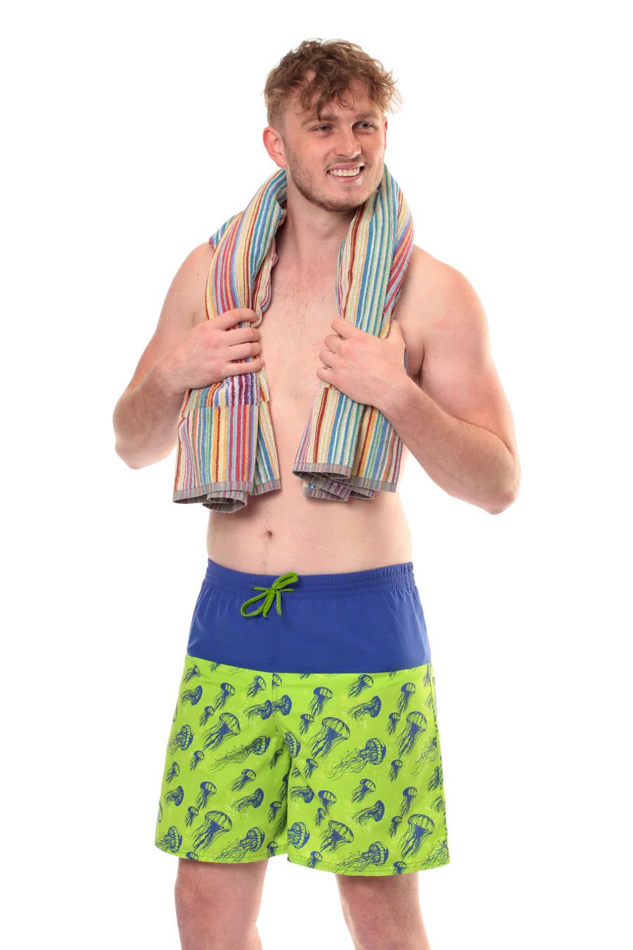 Man wears anenomi swim shorts in green and blue